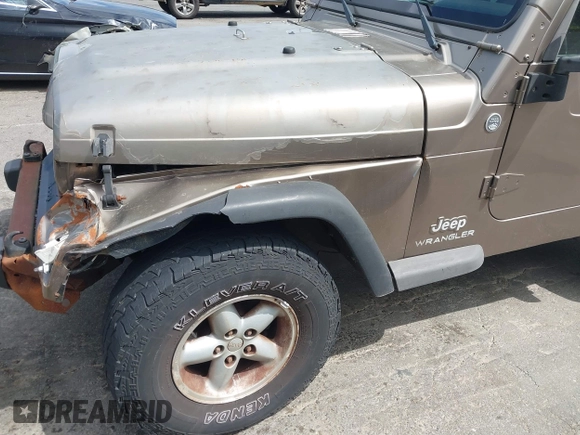 2005 Jeep Wrangler Sport with VIN 1J4FA49SX5P317120, listed as a IAAI auction lot 42677397 with 71,403 mi miles and . Bid and sale history available at DreamBid. Image 17.
