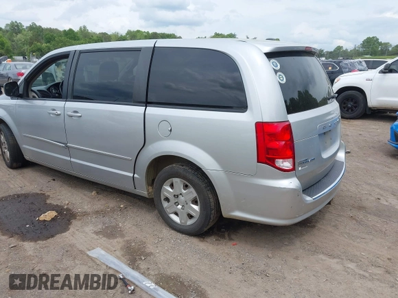 2011 Dodge Grand Caravan SXT with VIN 2D4RN4DGXBR600799, listed as a IAAI auction lot 42159972 with 257,571 mi miles and . Bid and sale history available at DreamBid. Image 3.