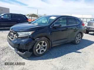 2018 Honda CR-V EX with VIN 7FARW1H57JE042281, listed as a IAAI auction lot 41897670 with 87,319 mi miles. Bid and sale history available at carsss.com. Image 6.