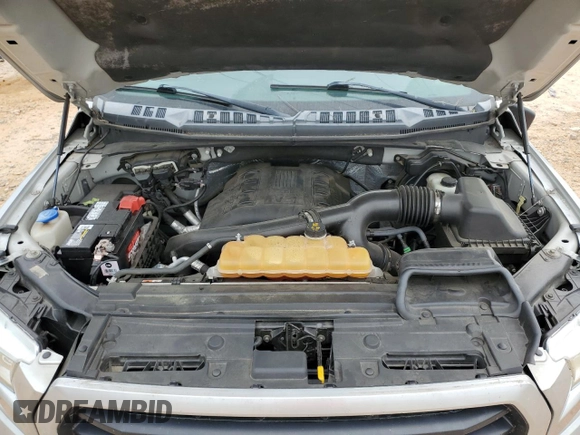 2015 Ford F-150 XLT с VIN 1FTEW1EG7FFA86557, выставлен на аукционе Copart как лот 55927575 с пробегом 124 812 миль миль и Списание • Salvage title. История ставок и продаж доступна на DreamBid. Изображение 11.