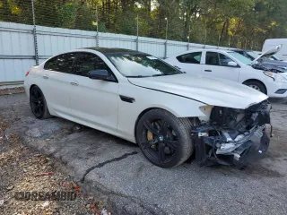 2016 BMW M6 z VIN WBS6E9C51GG437202, wystawiony jako Copart lot #71389434 z przebiegiem 80 673 mil mil oraz Szkoda całkowita • Salvage title. Historia ofert i sprzedaży dostępna na DreamBid. Obrazek 4.