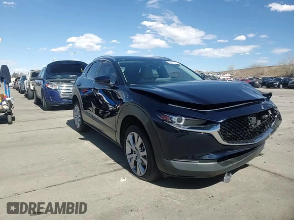 2023 Mazda CX-30 S Carbon Edition z VIN 3MVDMBCM3PM554378, wystawiony jako Copart lot #50558075 z przebiegiem 26 658 mil mil oraz Szkoda całkowita • Salvage title. Historia ofert i sprzedaży dostępna na DreamBid. Obrazek 14.
