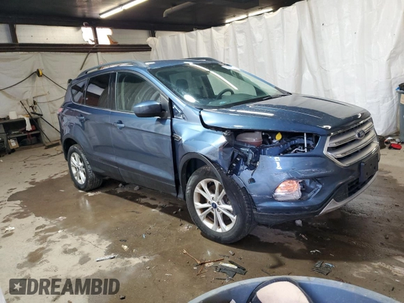 2018 Ford Escape SE z VIN 1FMCU9GD6JUC30324, wystawiony jako Copart lot #55833765 z przebiegiem 48 016 mil mil oraz Szkoda całkowita • Salvage title. Historia ofert i sprzedaży dostępna na DreamBid. Obrazek 4.