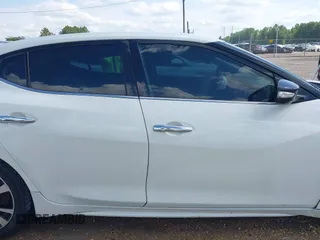 2018 Nissan Maxima SV z VIN 1N4AA6AP0JC380088, wystawiony jako IAAI lot #42221238 z przebiegiem 212 634 mil mil oraz . Historia ofert i sprzedaży dostępna na DreamBid. Obrazek 13.
