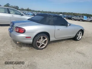 2003 Mazda MX-5 Miata Cloth with VIN JM1NB353430304103, listed as a Copart auction lot 50574245 with Not provided miles and Salvage title. Bid and sale history available at DreamBid. Image 3.