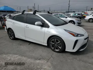 2021 Toyota Prius L Eco with VIN JTDKAMFUXM3149396, listed as a Copart auction lot 61874195 with 126,473 mi miles and Salvage title. Bid and sale history available at DreamBid. Image 4.
