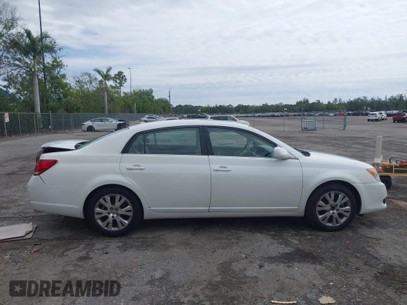 2010 Toyota Avalon XL with VIN 4T1BK3DB8AU354533, listed as a IAAI auction lot 41802797 with 117,956 mi miles and . Bid and sale history available at carsss.com. Image 13.