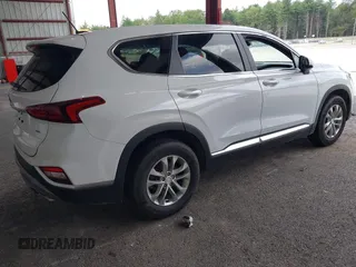 2019 Hyundai Santa Fe SE with VIN 5NMS2CAD2KH116731, listed as a IAAI auction lot 42689306 with 55,213 mi miles and . Bid and sale history available at DreamBid. Image 4.