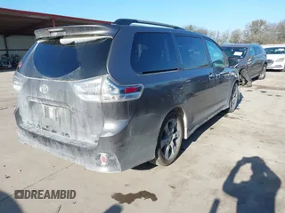 2014 Toyota Sienna SE with VIN 5TDXK3DC7ES482954, listed as a IAAI auction lot 41197465 with 160,107 mi miles and . Bid and sale history available at DreamBid. Image 4.
