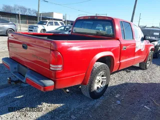 2003 Dodge Dakota Sport with VIN 1D7HL38N73S299948, listed as a IAAI auction lot 41392261 with 271,377 mi miles. Bid and sale history available at carsss.com. Image 4.