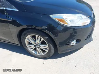 2012 Ford Focus SEL with VIN 1FAHP3H20CL269601, listed as a IAAI auction lot 42007095 with 146,634 mi miles. Bid and sale history available at carsss.com. Image 6.