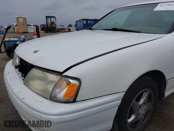 1998 Toyota Avalon XL with VIN 4T1BF18B7WU286333, listed as a IAAI auction lot 41736612 with 227,948 mi miles and . Bid and sale history available at DreamBid. Image 6.
