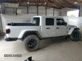 2020 Jeep Gladiator Rubicon z VIN 1C6JJTBG4LL102523, wystawiony jako Copart lot #54735955 z przebiegiem 104 579 mil mil oraz Szkoda całkowita • Salvage title. Historia ofert i sprzedaży dostępna na DreamBid. Obrazek 3.