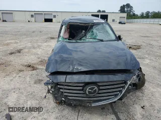 2023 Mazda CX-9 Touring z VIN JM3TCBCY5P0647237, wystawiony jako Copart lot #56338625 z przebiegiem Nie podano mil oraz Szkoda całkowita • Salvage title. Historia ofert i sprzedaży dostępna na DreamBid. Obrazek 5.