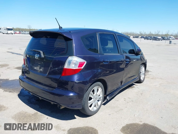 2009 Honda Fit Sport with VIN JHMGE88479S007307, listed as a IAAI auction lot 41801827 with 212,998 mi miles. Bid and sale history available at carsss.com. Image 4.