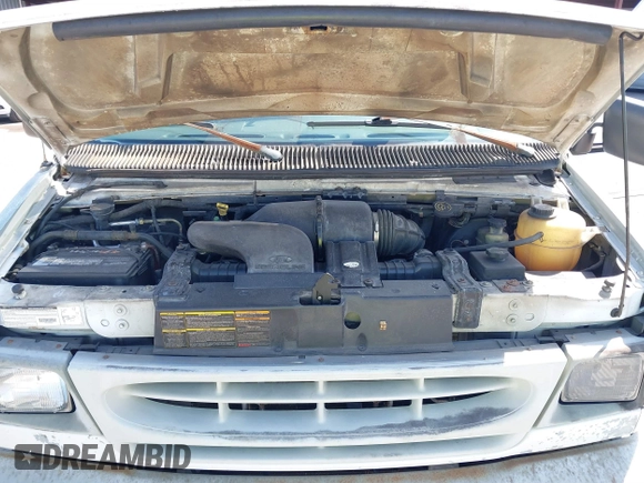 1999 Ford Econoline Cargo with VIN 1FTRE1428XHA20390, listed as a IAAI auction lot 41806875 with 207,954 mi miles. Bid and sale history available at carsss.com. Image 10.