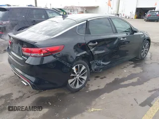 2016 Kia Optima SX Turbo with VIN 5XXGW4L2XGG052746, listed as a IAAI auction lot 41306792 with 69,571 mi miles and . Bid and sale history available at carsss.com. Image 4.