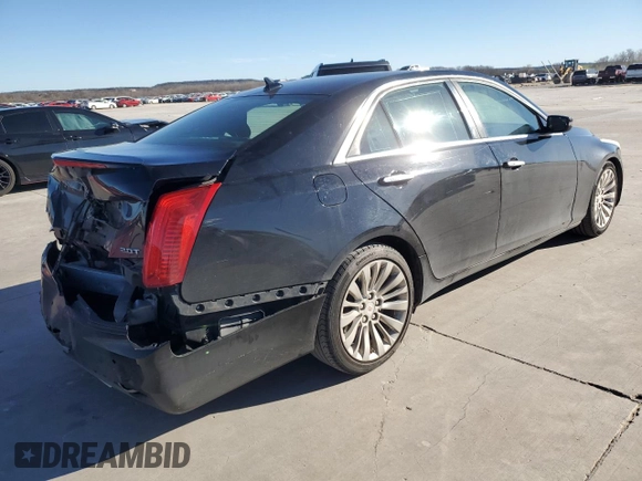 2014 Cadillac CTS Performance RWD with VIN 1G6AS5SX7E0184479, listed as a Copart auction lot 87076074 with 121,927 mi miles and Clean title. Bid and sale history available at DreamBid. Image 3.