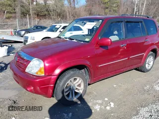 2004 Suzuki XL7 LX z VIN JS3TX92V844110977, wystawiony jako IAAI lot #41343611 z przebiegiem 64 773 mil mil oraz . Historia ofert i sprzedaży dostępna na DreamBid. Obrazek 2.