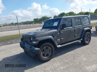 2019 Jeep Wrangler Unlimited Sport S z VIN 1C4HJXDN9KW636592, wystawiony jako IAAI lot #42159099 z przebiegiem 82 580 mil mil oraz . Historia ofert i sprzedaży dostępna na DreamBid. Obrazek 18.