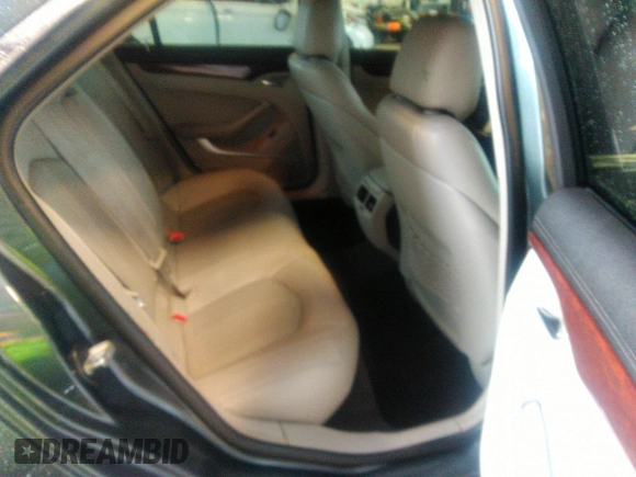 2013 Cadillac CTS Luxury with VIN 1G6DE5E54D0156491, listed as a IAAI auction lot 39844556 with 104,089 mi miles and . Bid and sale history available at DreamBid. Image 8.