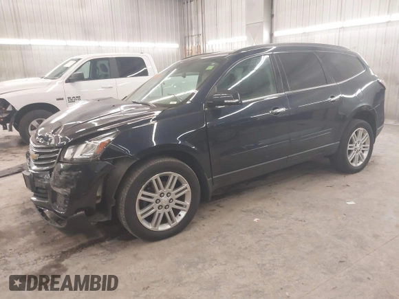 2015 Chevrolet Traverse LT with VIN 1GNKVGKDXFJ310363, listed as a IAAI auction lot 41044106 with 174,139 mi miles and . Bid and sale history available at DreamBid. Image 2.