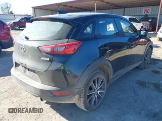2018 Mazda CX-3 Touring with VIN JM1DKDC70J0325325, listed as a IAAI auction lot 40914334 with 63,978 mi miles. Bid and sale history available at carsss.com. Image 4.