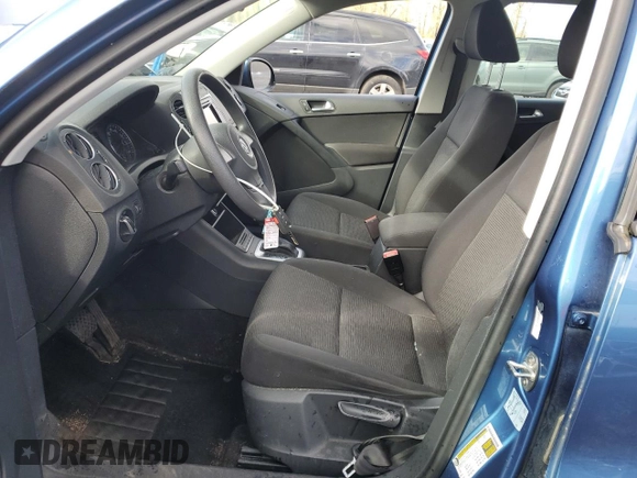 2017 Volkswagen Tiguan S with VIN WVGBV7AX1HK052098, listed as a Copart auction lot 51115295 with 53,906 mi miles and Salvage Title. Bid and sale history available at DreamBid. Image 7.