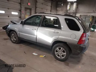 2005 Kia Sportage LX with VIN KNDJE723X57071792, listed as a IAAI auction lot 41441318 with 249,652 mi miles and . Bid and sale history available at carsss.com. Image 3.