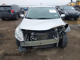 2016 Nissan Versa S with VIN 3N1CN7APXGL860037, listed as a IAAI auction lot 41602972 with 79,367 mi miles. Bid and sale history available at carsss.com. Image 6.