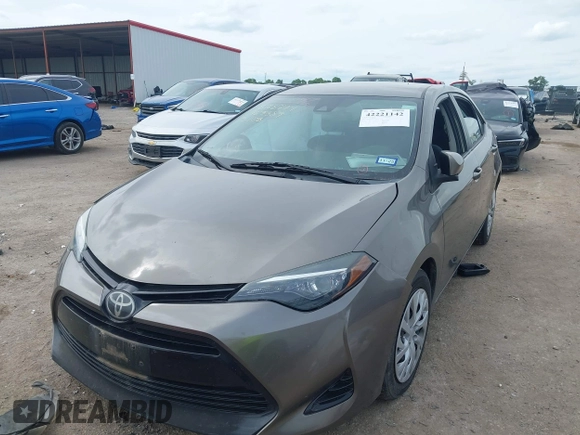 2018 Toyota Corolla L with VIN 2T1BURHE1JC983389, listed as a IAAI auction lot 42221142 with 79,113 mi miles and . Bid and sale history available at DreamBid. Image 17.