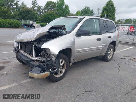 2004 GMC Envoy SLE с VIN 1GKDT13S242361580, выставлен на аукционе IAAI как лот 42453931 с пробегом 174 776 миль миль и . История ставок и продаж доступна на DreamBid. Изображение 2.