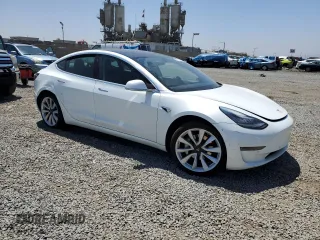 2019 Tesla Model 3 Mid Range z VIN 5YJ3E1EA3KF402556, wystawiony jako Copart lot #56212875 z przebiegiem 89 022 mil mil oraz Szkoda całkowita • Salvage title. Historia ofert i sprzedaży dostępna na DreamBid. Obrazek 4.
