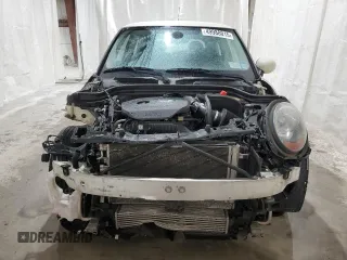 2015 MINI Hardtop with VIN WMWXM5C58FT973235, listed as a Copart auction lot 49988015 with 119,683 mi miles and Salvage Title. Bid and sale history available at DreamBid. Image 5.