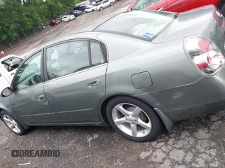 2005 Nissan Altima SE z VIN 1N4BL11DX5C234245, wystawiony jako IAAI lot #42169408 z przebiegiem 153 085 mil mil oraz . Historia ofert i sprzedaży dostępna na DreamBid. Obrazek 14.