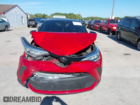 2020 Toyota C-HR LE with VIN JTNKHMBX3L1066720, listed as a IAAI auction lot 42042139 with 98,925 mi miles and . Bid and sale history available at DreamBid. Image 12.