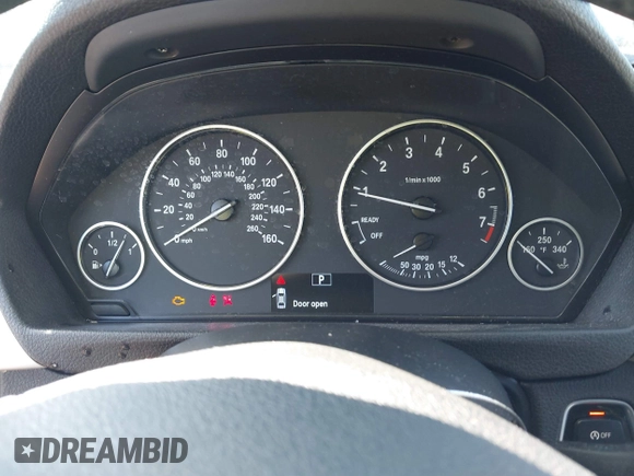 2014 BMW 3 Series 328i with VIN WBA3C1C56EAV79706, listed as a IAAI auction lot 41807033 with 104,478 mi miles. Bid and sale history available at carsss.com. Image 7.