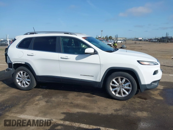 2016 Jeep Cherokee Limited with VIN 1C4PJMDS4GW310495, listed as a IAAI auction lot 41978324 with 70,182 mi miles. Bid and sale history available at carsss.com. Image 14.