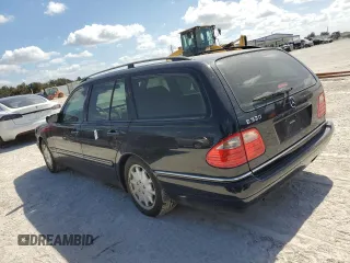 1998 Mercedes-Benz E-Class with VIN WDBJH65F2WA689599, listed as a Copart auction lot 76712344 with 0 mi miles and Salvage Title. Bid and sale history available at carsss.com. Image 2.