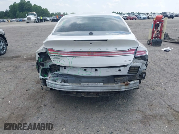 2014 Lincoln MKZ Hybrid z VIN 3LN6L2LU2ER825732, wystawiony jako IAAI lot #42606357 z przebiegiem 153 966 mil mil oraz . Historia ofert i sprzedaży dostępna na DreamBid. Obrazek 6.