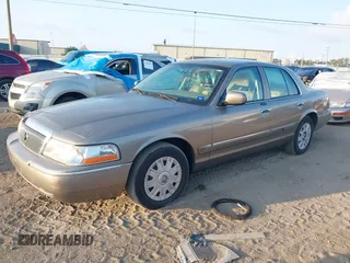2004 Mercury Grand Marquis GS with VIN 2MEFM74WX4X696703, listed as a IAAI auction lot 42171970 with 149,556 mi miles and . Bid and sale history available at DreamBid. Image 20.