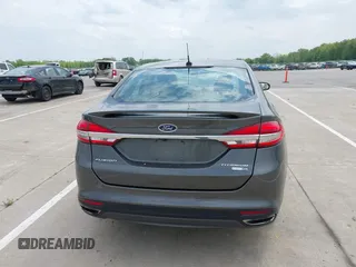 2017 Ford Fusion Titanium with VIN 3FA6P0D93HR261526, listed as a IAAI auction lot 42277350 with 117,388 mi miles and . Bid and sale history available at DreamBid. Image 16.