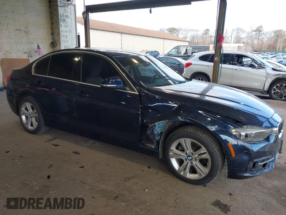 2017 BMW 3 Series 330i xDrive with VIN WBA8D9G51HNU60678, listed as a IAAI auction lot 41262500 with 87,900 mi miles. Bid and sale history available at carsss.com. Image 1.