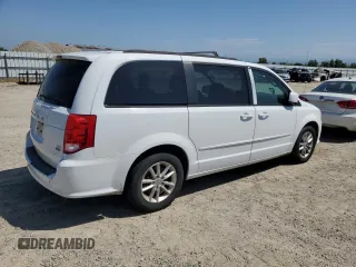 2014 Dodge Grand Caravan SXT z VIN 2C4RDGCG1ER433319, wystawiony jako Copart lot #55533885 z przebiegiem 146 550 mil mil oraz Czysty tytuł • Clean title. Historia ofert i sprzedaży dostępna na DreamBid. Obrazek 3.