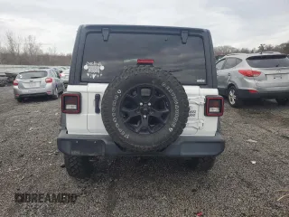 2021 Jeep Wrangler Unlimited Willys with VIN 1C4HJXDN9MW509795, listed as a Copart auction lot 51667375 with 53,473 mi miles and Salvage Title. Bid and sale history available at DreamBid. Image 6.