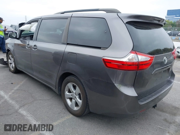 2015 Toyota Sienna LE AAS with VIN 5TDKK3DC5FS606862, listed as a IAAI auction lot 42464119 with 158,135 mi miles and . Bid and sale history available at DreamBid. Image 3.