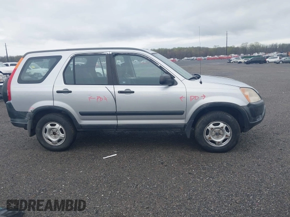 2003 Honda CR-V LX with VIN JHLRD685X3C005548, listed as a IAAI auction lot 41955514 with 206,661 mi miles and . Bid and sale history available at DreamBid. Image 14.