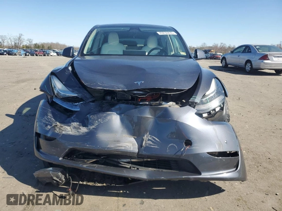 2022 Tesla Model Y Long Range z VIN 7SAYGAEE5NF573044, wystawiony jako Copart lot #49230835 z przebiegiem 41 220 mil mil oraz Szkody całkowita. Historia ofert i sprzedaży dostępna na DreamBid. Obrazek 5.