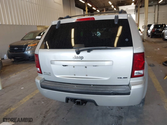 2010 Jeep Grand Cherokee Laredo with VIN 1J4RR4GT9AC106381, listed as a IAAI auction lot 41723268 with 180,008 mi miles. Bid and sale history available at carsss.com. Image 16.