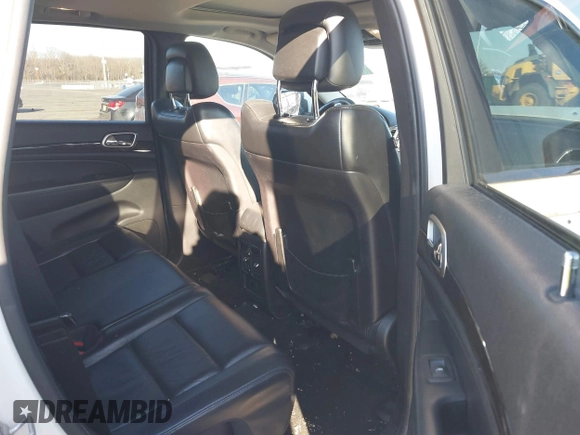 2012 Jeep Grand Cherokee Laredo with VIN 1C4RJFAG5CC310893, listed as a IAAI auction lot 41695279 with 136,821 mi miles. Bid and sale history available at carsss.com. Image 8.